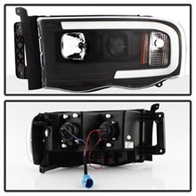 Load image into Gallery viewer, 02-05-Dodge-Ram-1500-Light-Bar-Projector-Headlights---Black-(Pro-Yd-Dr02v2-Lb-Bk)