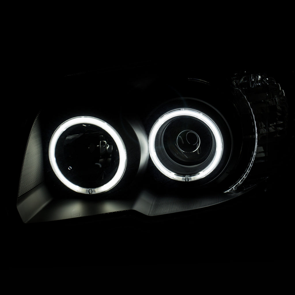 0609-4Runner-Projector-Headlights-WUbar-Black-Clear-DriverPassenger