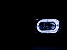 Load image into Gallery viewer, ANZO USA 111005 Crystal Headlight Set w/Halo for Select Chevrolet Blazer, Chevrolet C1500, Chevrolet C1500 Suburban, Chevrolet C2500, Chevrolet C2500 Suburban, Chevrolet C3500, Chevrolet K1500, Chevrolet K1500 Suburban, Chevrolet K2500, Chevrolet K2500