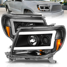 Load image into Gallery viewer, ANZO USA 111517 Projector Headlight for Select Toyota Tacoma