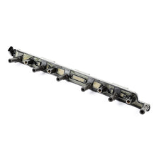 Load image into Gallery viewer, Omix 17247.19 Ignition Coil Cassette for Select Jeep Cherokee, Jeep Grand Cherokee, Jeep TJ, Jeep Wrangler