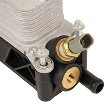 Load image into Gallery viewer, Omix 17436.52 Oil Filter Housing Assembly for Select Jeep Grand Cherokee, Jeep Wrangler