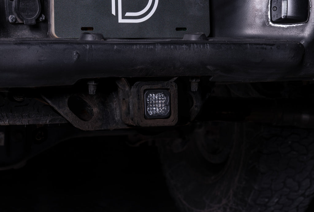Diode Dynamics DD7647 Allows you to mount a C1R LED pod in the Toyota Tacoma trailer hitch receiver.