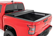 Load image into Gallery viewer, Rough Country 49520551A Hard Tri-Fold Tonneau Bed Cover for Select Nissan Frontier