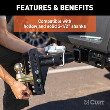 Load image into Gallery viewer, CURT 22320 No-Tool Anti-Rattle Hitch Clamp for 2-1/2" Receiver