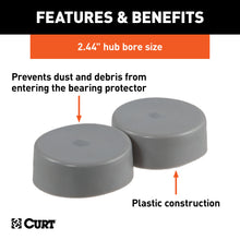 Load image into Gallery viewer, CURT 23244 2.44" Bearing Protector Dust Covers (2-Pack)