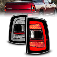 Load image into Gallery viewer, ANZO USA 311469 RAM 1500 09-18, 2500/3500 10-18 LED TAIL LIGHTS BLACK CLEAR LENS W/ SQTL SIGNAL for Select Dodge Ram 1500, Dodge Ram 2500, Dodge Ram 3500, Ram 1500, Ram 2500, Ram