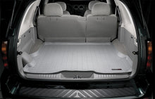 Load image into Gallery viewer, Weathertech 42188 Cargo Liner for Select Buick Rainier, Chevrolet Trailblazer, GMC Envoy, GMC Envoy XL, GMC Envoy XUV, Isuzu Ascender, Oldsmobile Bravada, Saab 9-7x