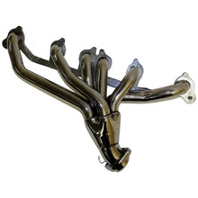 Load image into Gallery viewer, Crown Automotive Jeep Replacement 4883385 Exhaust Manifold  for 1991-1999 Jeep TJ, YJ, XJ, MJ, ZJ w/ 4.0L Engine for Select Jeep Cherokee, Jeep Comanche, Jeep Grand Cherokee, Jeep TJ, Jeep Wrangler
