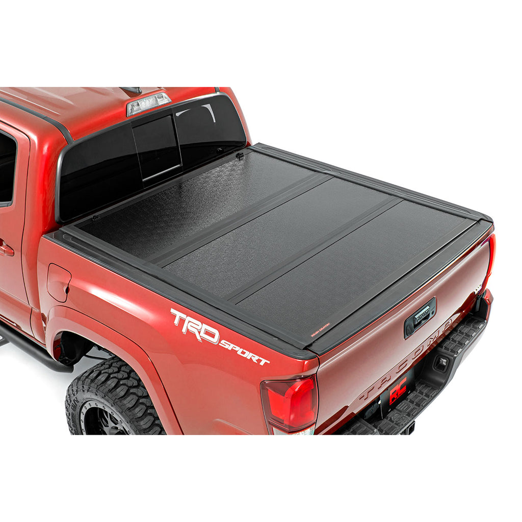 ~(70-Lbs.-70X33x6)~-Toyota-Low-Profile-Hard-Tri-Fold-Tonneau-Cover-(16-20-Tacoma-5Ft-Bed)