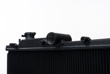 Load image into Gallery viewer, CSF Cooling - Racing &amp; High Performance Division 7095B 08-14 Subaru WRX / STI / 15-21 Subaru WRX 2-Row 42mm Race-Spec Radiator - Black for Select Subaru Crosstrek, Subaru Forester, Subaru Impreza, Subaru Legacy, Subaru Outback, Subaru WRX, Subaru WRX STI