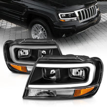 Load image into Gallery viewer, 99-04-Jeep-Grand-Cherokee-Crystal-Headlights---W-Light-Bar-Black-Housing
