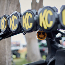 Load image into Gallery viewer, KC HiLiTES 9963 KC 3.5" Smiley Air Freshener with Ocean Breeze scent
