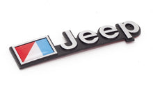 Load image into Gallery viewer, Omix DMC-5451627 Emblem for Select Jeep CJ5, Jeep CJ7, Jeep Cherokee, Jeep Comanche, Jeep Grand Wagoneer, Jeep J10, Jeep J20, Jeep Scrambler, Jeep Wagoneer, Jeep Wrangler