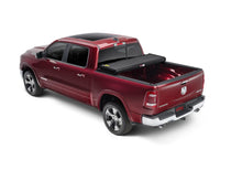 Load image into Gallery viewer, Extang 83424 Solid Fold 2.0 - 19-25 (New Body) Ram 5'7" w/ RamBox w/ or w/o Multifunction TG for Select Ram