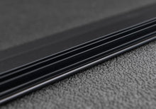 Load image into Gallery viewer, Extang 83424 Solid Fold 2.0 - 19-25 (New Body) Ram 5'7" w/ RamBox w/ or w/o Multifunction TG for Select Ram