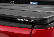 Load image into Gallery viewer, Extang 84422 Solid Fold 2.0 Toolbox-19-26 (New Body) Ram 1500 6'4" w/o RmBx w/o Multifnctn TG for Select Ram