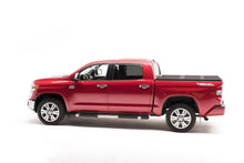 Load image into Gallery viewer, Extang 83473 Solid Fold 2.0 - 22-25 Tundra 6'7" w/ or w/out Deck Rail System for Select Toyota Tundra