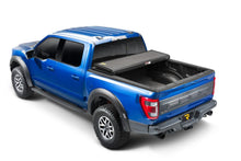 Load image into Gallery viewer, Extang 88985 Solid Fold ALX - 05-21 Frontier 4'11" w/ Factory Bed Rail Caps for Select Nissan Frontier, Suzuki Equator