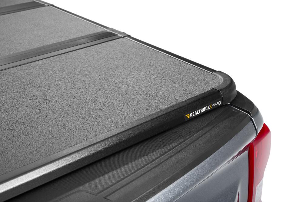 Extang 88653 Solid Fold ALX - 20-26 Silv/Sierra 2500HD/3500HD 6'9" w/out Factory Side Storage for Select Chevrolet Silverado HD, Chevrolet Silverado HD, GMC Sierra HD, GMC Sierra HD