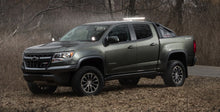 Load image into Gallery viewer, Baja Designs 447604 Squadron Pro A-Pillar Light Kit for Select Chevrolet Colorado, Chevrolet Silverado 1500, GMC Canyon, GMC Sierra