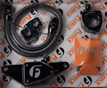 Load image into Gallery viewer, Fleece Performance FPE-CLNTBYPS-CUMMINS-MAN-SS Cummins Coolant Bypass Kit (2003-2007 Manual Transmission) for Select Dodge Ram 2500, Dodge Ram