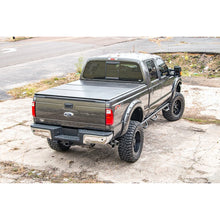 Load image into Gallery viewer, Ford-Hard-Tri-Fold-Bed-Cover-99-16-F-250350-6.5-Foot-Bed-WO-Cargo-Mgmt-Rough-Country