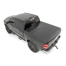Load image into Gallery viewer, Hard-Folding-Bed-Cover-5.5-Ft-Bed-Ram-1500-2Wd4Wd-(10-23-And-Classic)-Rough-Country