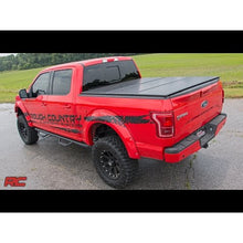 Load image into Gallery viewer, Hard-Folding-Bed-Cover-5.5-Ft-Bed-Ram-1500-2Wd4Wd-(10-23-And-Classic)-Rough-Country