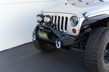Load image into Gallery viewer, DV8 Offroad LPBM-02 Fairlead Mounted Flip-Up License Plate Bracket