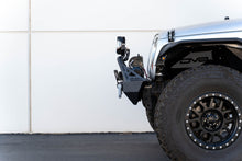Load image into Gallery viewer, DV8 Offroad LPBM-02 Fairlead Mounted Flip-Up License Plate Bracket
