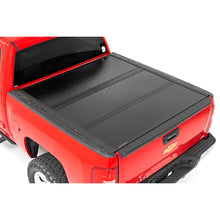 Load image into Gallery viewer, Low-Profile-Hard-Tri-Fold-Tonneau-Cover-07-13-1500-5.5-Foot-Bed-WRail-Caps-Rough-Country
