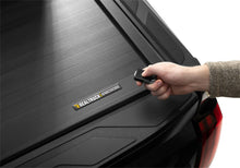 Load image into Gallery viewer, Roll N Lock 575E-XT E-Series XT-22-26 Tundra 5ft.7in. w/out Trail Special Edtn Strg Bxs for Select Toyota Tundra