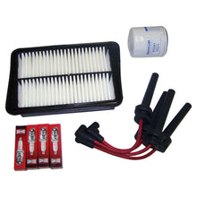 Load image into Gallery viewer, Crown Automotive Jeep Replacement TK40 Tune Up Kit for 2004-2005 Jeep KJ Liberty w/ 2.4L Engine for Select Jeep Liberty