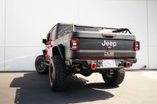 Load image into Gallery viewer, DV8 Offroad UNSK-01RD Red DV8 Elite Series D-Rings (Pair)