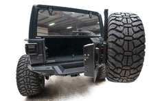 Load image into Gallery viewer, Fab Fours JL18-Y1851T-1 Off The Door Tire Carrier for Select Jeep Wrangler