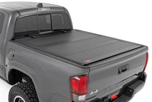 Load image into Gallery viewer, Rough Country 49420500 Hard Tri-Fold Tonneau Bed Cover for Select Toyota Tacoma