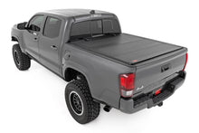 Load image into Gallery viewer, Rough Country 49420500 Hard Tri-Fold Tonneau Bed Cover for Select Toyota Tacoma