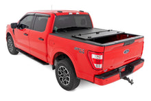Load image into Gallery viewer, Rough Country 49220550 Hard Tri-Fold Tonneau Bed Cover for Select Ford F-150