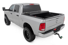 Load image into Gallery viewer, Rough Country 49318650 Hard Tri-Fold Tonneau Bed Cover for Select Dodge Ram 1500, Dodge Ram 2500, Ram 1500, Ram Classic, Ram
