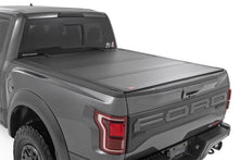 Load image into Gallery viewer, Rough Country 49221550 Hard Tri-Fold Tonneau Bed Cover for Select Ford F-150, Ford F-150 Lightning