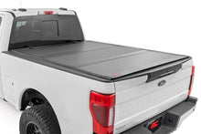 Load image into Gallery viewer, Rough Country 49220651 Hard Tri-Fold Tonneau Bed Cover for Select Ford F-250 Super Duty, Ford F-350 Super Duty