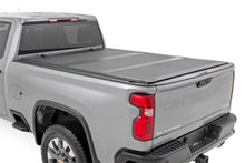 Load image into Gallery viewer, Rough Country 49120651 Hard Tri-Fold Tonneau Bed Cover for Select Chevrolet Silverado HD, Chevrolet Silverado HD, GMC Sierra HD, GMC Sierra HD