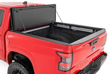 Load image into Gallery viewer, Rough Country 49520551A Hard Tri-Fold Tonneau Bed Cover for Select Nissan Frontier