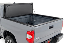 Load image into Gallery viewer, Rough Country 49414551 Hard Tri-Fold Tonneau Bed Cover for Select Toyota Tundra