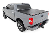Load image into Gallery viewer, Rough Country 49414551 Hard Tri-Fold Tonneau Bed Cover for Select Toyota Tundra