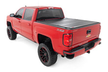 Load image into Gallery viewer, Rough Country 49119551 Hard Tri-Fold Tonneau Bed Cover for Select Chevrolet Silverado 1500, GMC Sierra