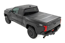 Load image into Gallery viewer, Rough Country 49420650 Hard Tri-Fold Tonneau Bed Cover for Select Toyota Tacoma