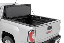 Load image into Gallery viewer, Rough Country 49120600 Hard Tri-Fold Tonneau Bed Cover for Select Chevrolet Colorado, GMC Canyon