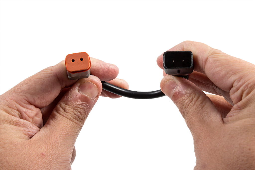 Diode Dynamics DD4077 Converts a DT-style plug to your factory connector size.
